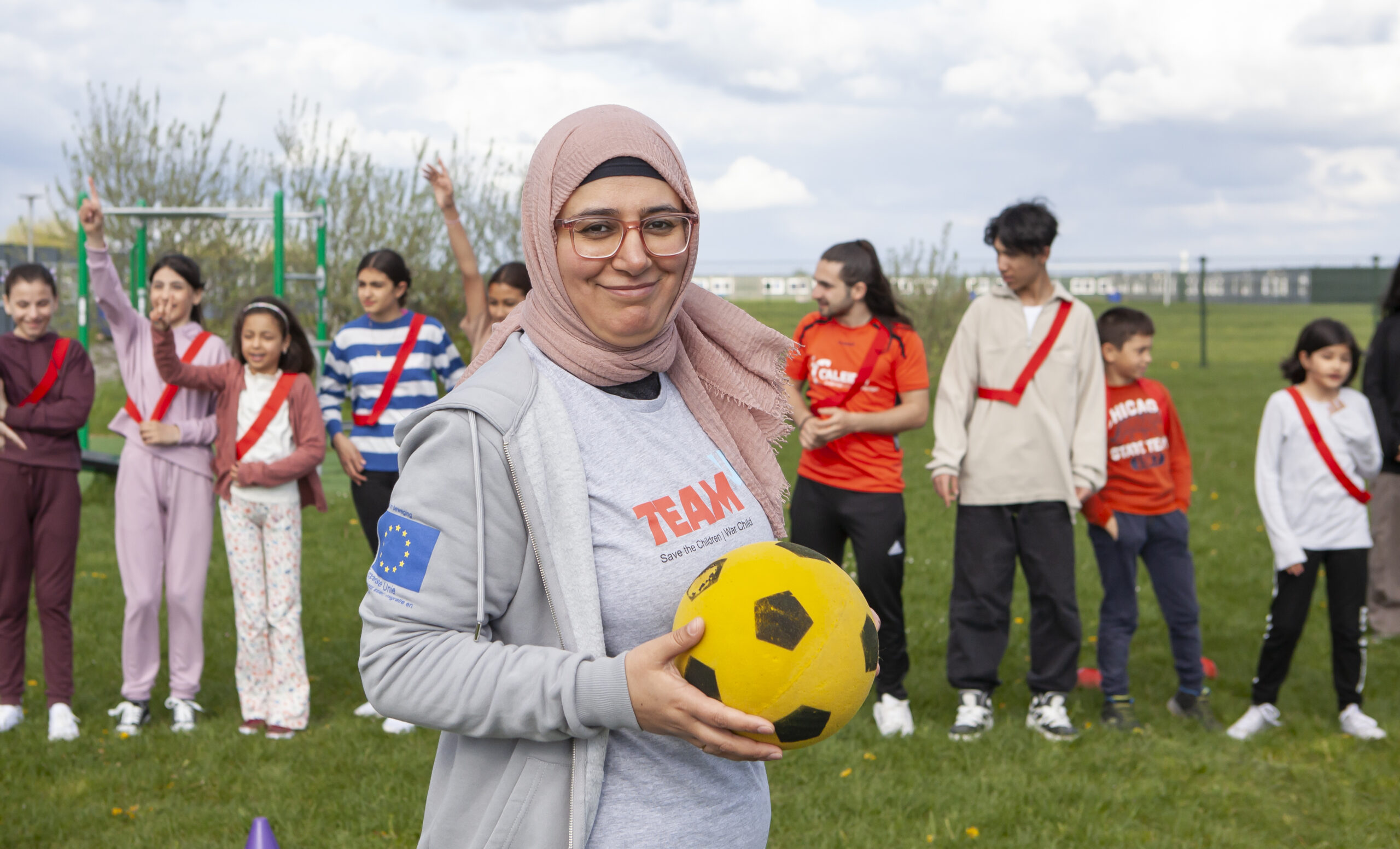 Help refugee children through play and exercise