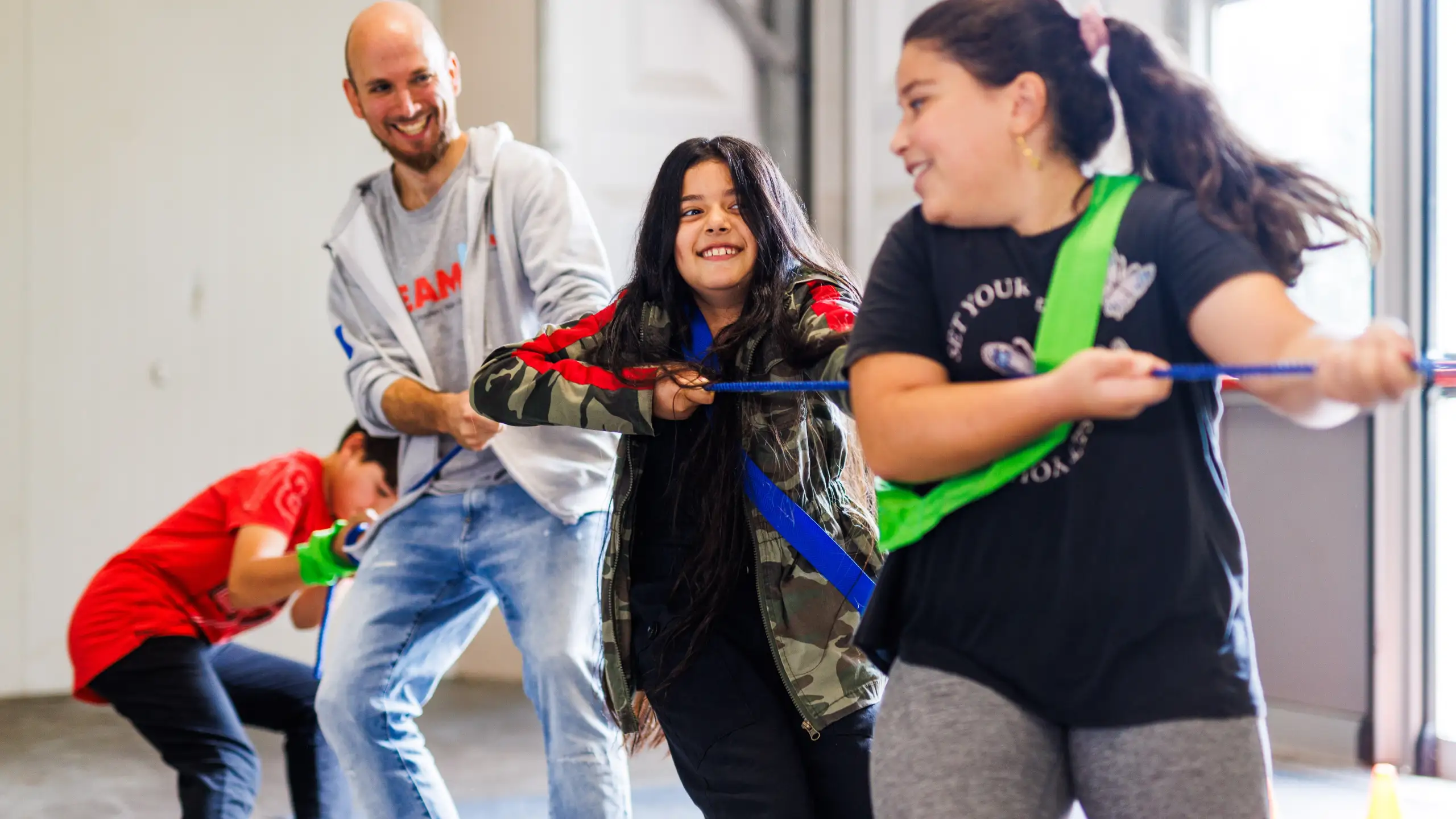 Help refugee children through play and exercise
